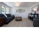 Inviting living room featuring ample natural light and modern decor at 466 Sunnyside Dr, Venice, FL 34293
