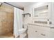 Clean, bright bathroom with a tiled shower, modern vanity, and well-lit mirror for a functional space at 5014 Marshfield Rd # 30, Sarasota, FL 34235