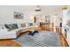 Spacious living room with nautical decor, hardwood floors and comfortable seating at 5014 Marshfield Rd # 30, Sarasota, FL 34235