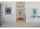 Bright hallway with arched doorways and stylish decorations at 524 Schooner Ln, Longboat Key, FL 34228