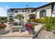 A stunning backyard oasis with a large pool and lush landscaping perfect for relaxation and entertainment at 524 Schooner Ln, Longboat Key, FL 34228