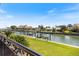 Waterfront canal view of the home's boat dock at 524 Schooner Ln, Longboat Key, FL 34228