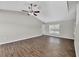 Spacious bedroom with a ceiling fan and large window; vinyl plank flooring throughout at 5642 29Th Street E Cir, Bradenton, FL 34203