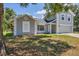 Charming two-story home with a well-maintained lawn and neutral gray paint scheme at 5642 29Th Street E Cir, Bradenton, FL 34203