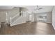 Bright, open living space with soaring ceilings and modern vinyl plank flooring throughout at 5642 29Th Street E Cir, Bradenton, FL 34203