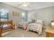 Comfortable bedroom with natural light, and tiled floors at 6007 Vivienda Dr # 29, Bradenton, FL 34207