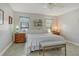 Light and bright bedroom with neutral colors, windows, and a ceiling fan at 6007 Vivienda Dr # 29, Bradenton, FL 34207