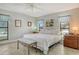 Cozy bedroom featuring two windows and decorative decor at 6007 Vivienda Dr # 29, Bradenton, FL 34207