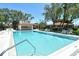 Enjoy the community pool with bar and ample seating for entertaining at 6007 Vivienda Dr # 29, Bradenton, FL 34207