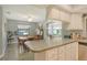 Open layout combines the kitchen, dining, and sunroom for easy entertaining at 6007 Vivienda Dr # 29, Bradenton, FL 34207