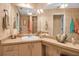 Bathroom featuring a vanity, a large mirror, and a shower at 6101 34Th W St # 9C, Bradenton, FL 34210