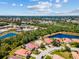 Aerial view of the community showcasing residences, mature landscaping, and ponds at 6532 Copper Ridge Trl, Bradenton, FL 34201