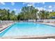 A large community pool with multiple lounge chairs for residents to enjoy at 6532 Copper Ridge Trl, Bradenton, FL 34201