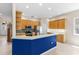 Eat-in kitchen featuring wooden cabinets, stainless appliances, and tile backsplash at 6532 Copper Ridge Trl, Bradenton, FL 34201