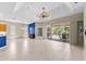Open-concept living room boasts high ceilings and sliding glass doors to outdoor living at 6532 Copper Ridge Trl, Bradenton, FL 34201