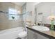 A well lit bathroom with a bath, shower, and toilet visible in the image at 6708 162Nd E Pl, Parrish, FL 34219