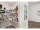 Organized walk-in pantry with wire shelving offers ample storage space and easy access to items at 6708 162Nd E Pl, Parrish, FL 34219
