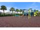 Outdoor playground including swings and slides for the community in front of the green grass at 6708 162Nd E Pl, Parrish, FL 34219