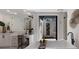 Bright bathroom featuring a soaking tub, a vanity with sink, and a courtyard view at 7011 Belmont Ct, Lakewood Ranch, FL 34202