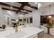 Open concept kitchen featuring white countertops and stainless steel appliances at 7011 Belmont Ct, Lakewood Ranch, FL 34202