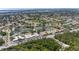 Overhead shot of the complex, nearby lakes, and picturesque residential area at 7218 Cloister Dr # 7218, Sarasota, FL 34231