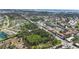 Aerial view showcases the community's lush surroundings and nearby amenities at 7218 Cloister Dr # 7218, Sarasota, FL 34231
