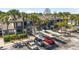 Exterior view of townhome featuring covered parking and well-maintained landscaping at 7218 Cloister Dr # 7218, Sarasota, FL 34231