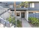 Charming two-story condo with a private entrance, landscaped with lush greenery and a lovely garden view at 7218 Cloister Dr # 7218, Sarasota, FL 34231