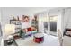 Cozy living room with neutral tones, comfortable seating, and patio access at 7218 Cloister Dr # 7218, Sarasota, FL 34231