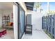 Outdoor patio space with chairs and sliding glass door offering indoor-outdoor flow at 7218 Cloister Dr # 7218, Sarasota, FL 34231