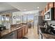 The kitchen features granite counters and stainless steel appliances and lots of natural light at 7607 Grand Estuary Trl # 302, Bradenton, FL 34212