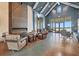 Bright and airy lounge area featuring a fireplace, comfortable seating, and modern decor at 8107 Slipway Dr, Sarasota, FL 34240