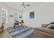 Bright office space with natural light, modern decor, and a comfortable seating area at 8107 Slipway Dr, Sarasota, FL 34240