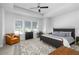 Bedroom with great natural light, ceiling fan and modern minimalist style furniture at 845 Burlington N Ave, St Petersburg, FL 33701