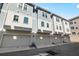 Townhomes feature attached garages, neutral exteriors, and multiple windows for ample natural light at 845 Burlington N Ave, St Petersburg, FL 33701