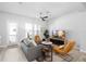 Cozy living room features neutral tones, ample seating, and natural light at 845 Burlington N Ave, St Petersburg, FL 33701