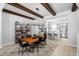 Open-concept living space featuring exposed beams and a spacious layout with modern decor at 845 Burlington N Ave, St Petersburg, FL 33701