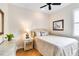 Comfortable bedroom with neutral decor and a quaint side table at 10008 Sugar Mill Dr, Bradenton, FL 34212