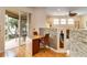 Bright breakfast nook with access to the outdoor patio through sliding glass doors at 10008 Sugar Mill Dr, Bradenton, FL 34212