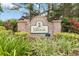 Millbrook community sign with lush landscaping in front at 10008 Sugar Mill Dr, Bradenton, FL 34212