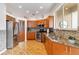 Modern kitchen featuring stainless steel appliances and granite countertops at 10008 Sugar Mill Dr, Bradenton, FL 34212