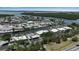 Scenic aerial shot of waterfront homes with deep water canal access leading to the bay and the Gulf of Mexico at 10415 Waterbird Way # 10415, Bradenton, FL 34209