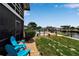 Serene backyard view with pool and canal access for relaxation and water activities at 10415 Waterbird Way # 10415, Bradenton, FL 34209