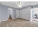Main bedroom features new flooring, closet space and access to ensuite bathroom at 10415 Waterbird Way # 10415, Bradenton, FL 34209