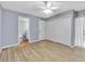Main bedroom features new flooring, closet space and ensuite bathroom at 10415 Waterbird Way # 10415, Bradenton, FL 34209