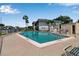 Community pool with lounge chairs and waterfront views for residents to enjoy at 10415 Waterbird Way # 10415, Bradenton, FL 34209