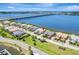 Aerial view of neighborhood with a bridge and water views with various buildings at 1264 Riverscape St # B, Bradenton, FL 34208