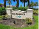Landscaped community sign featuring lush greenery at 1264 Riverscape St # B, Bradenton, FL 34208