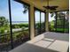 Spacious screened-in lanai with tranquil water views, perfect for outdoor living and entertaining at 1264 Riverscape St # B, Bradenton, FL 34208