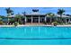 Beautiful community pool with an adjacent sundeck area for relaxing and enjoying the outdoors at 1264 Riverscape St # B, Bradenton, FL 34208